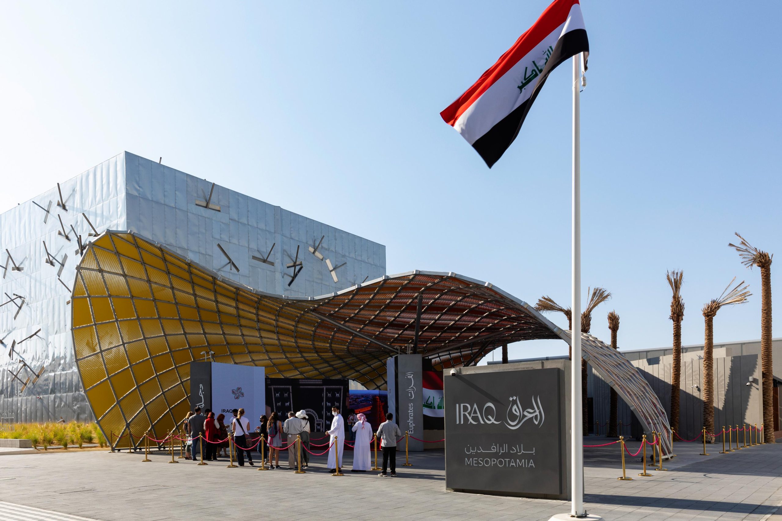 Visitors outside the Iraq Pavilion Web Image m18016 scaled